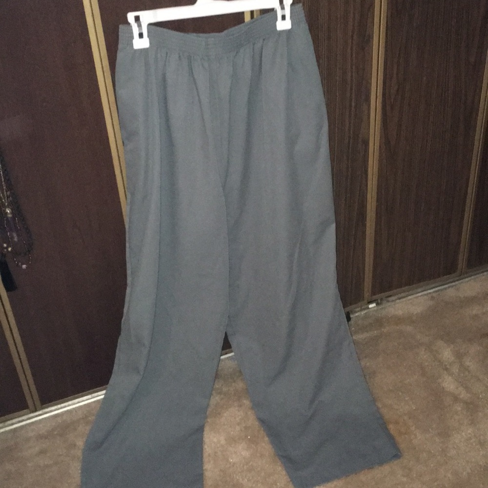 A pair of dress pants in Gray